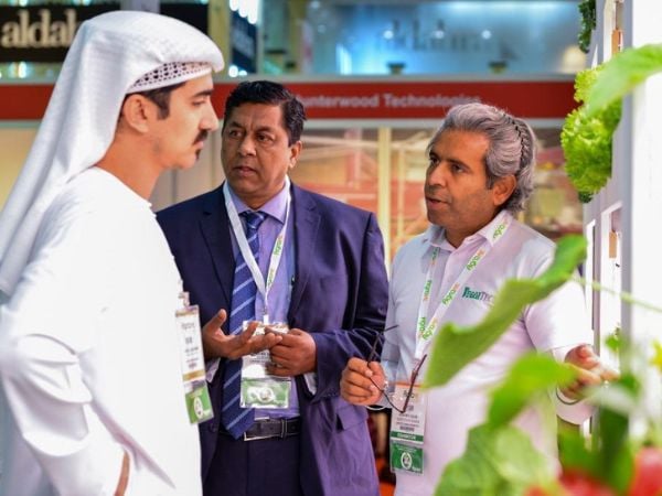 Visitors networking at Growtech Middle East exhibition stand